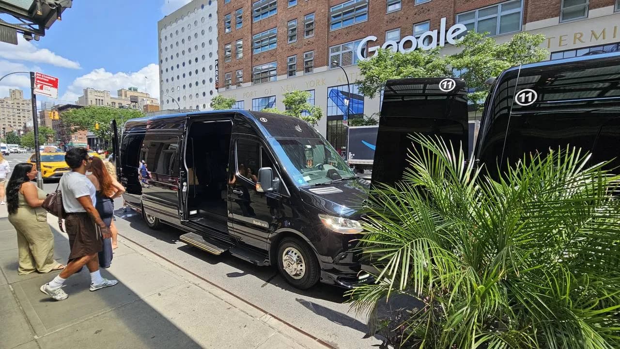 Two King & Queen Limo Mercedes Sprinter executive vans waiting for passengers in Chelsea, Manhattan.