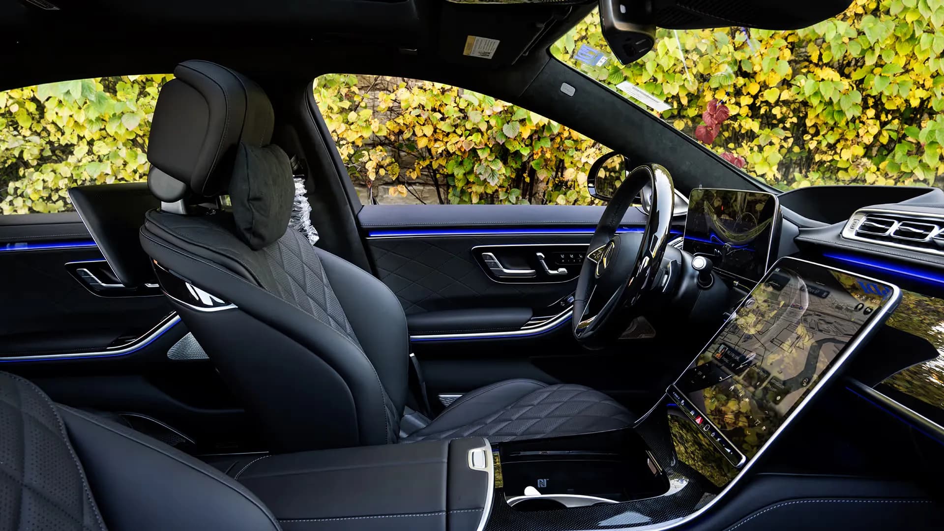 Mercedes S-Class interior with quilted black leather seats and ambient lighting