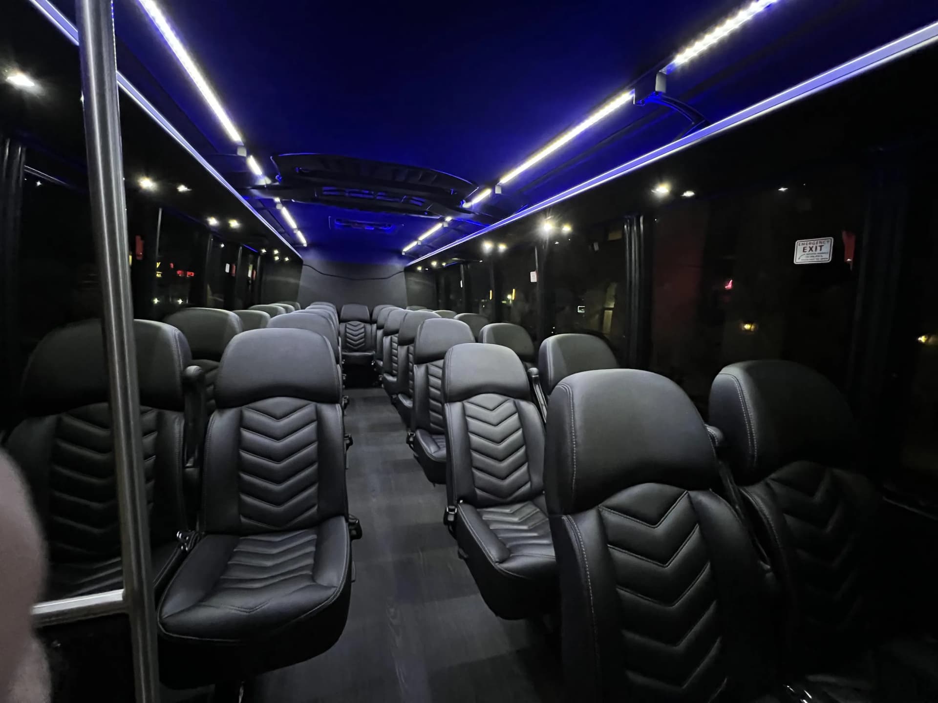 23 passenger mini bus interior with leather seats and blue LED lighting