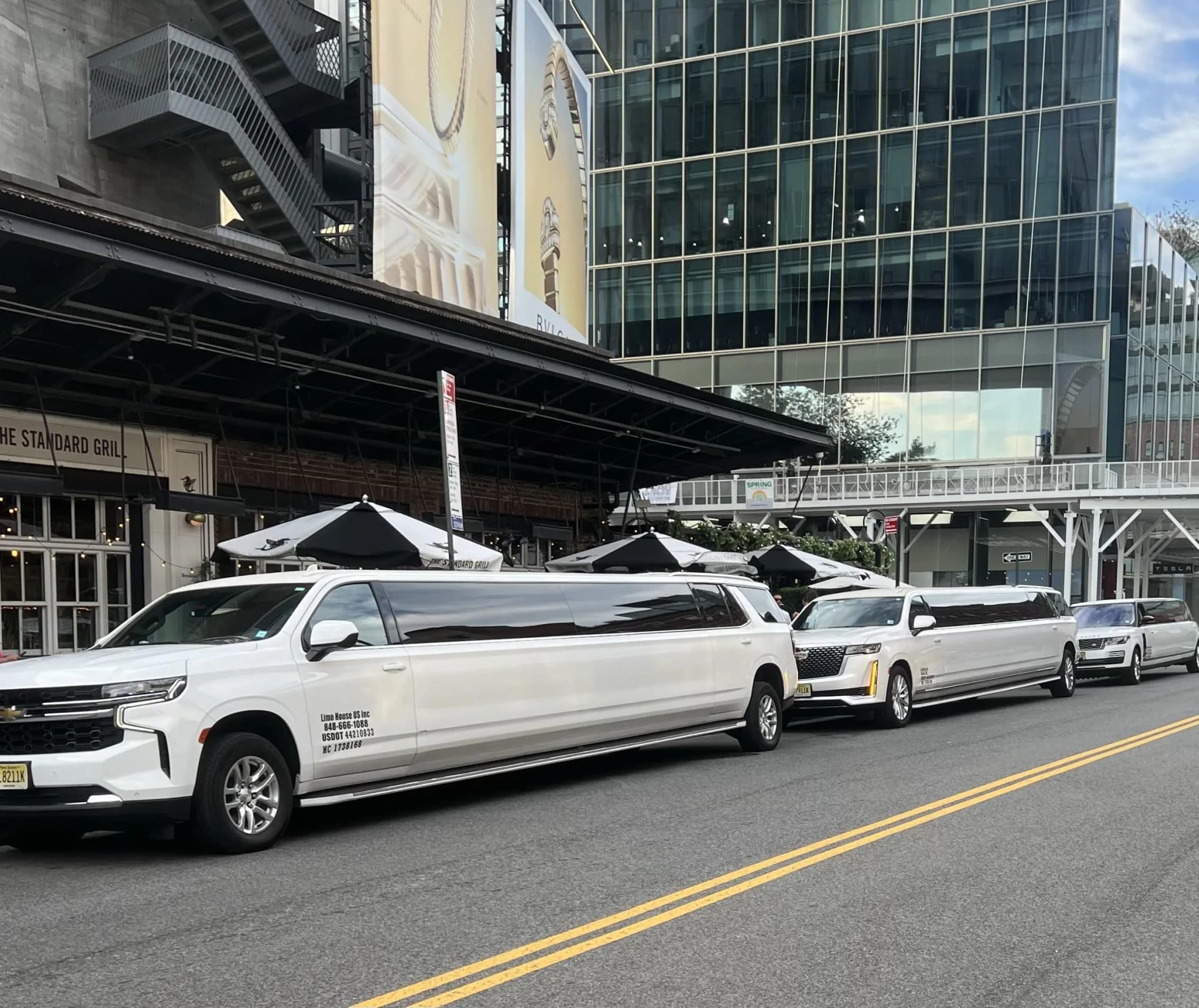 White Chevrolet stretch limousines lined up near the High Line