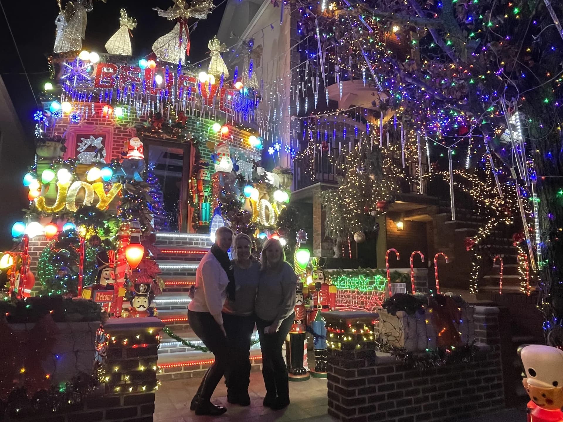 Guests at the Believe house on the Dyker Heights lights tour
