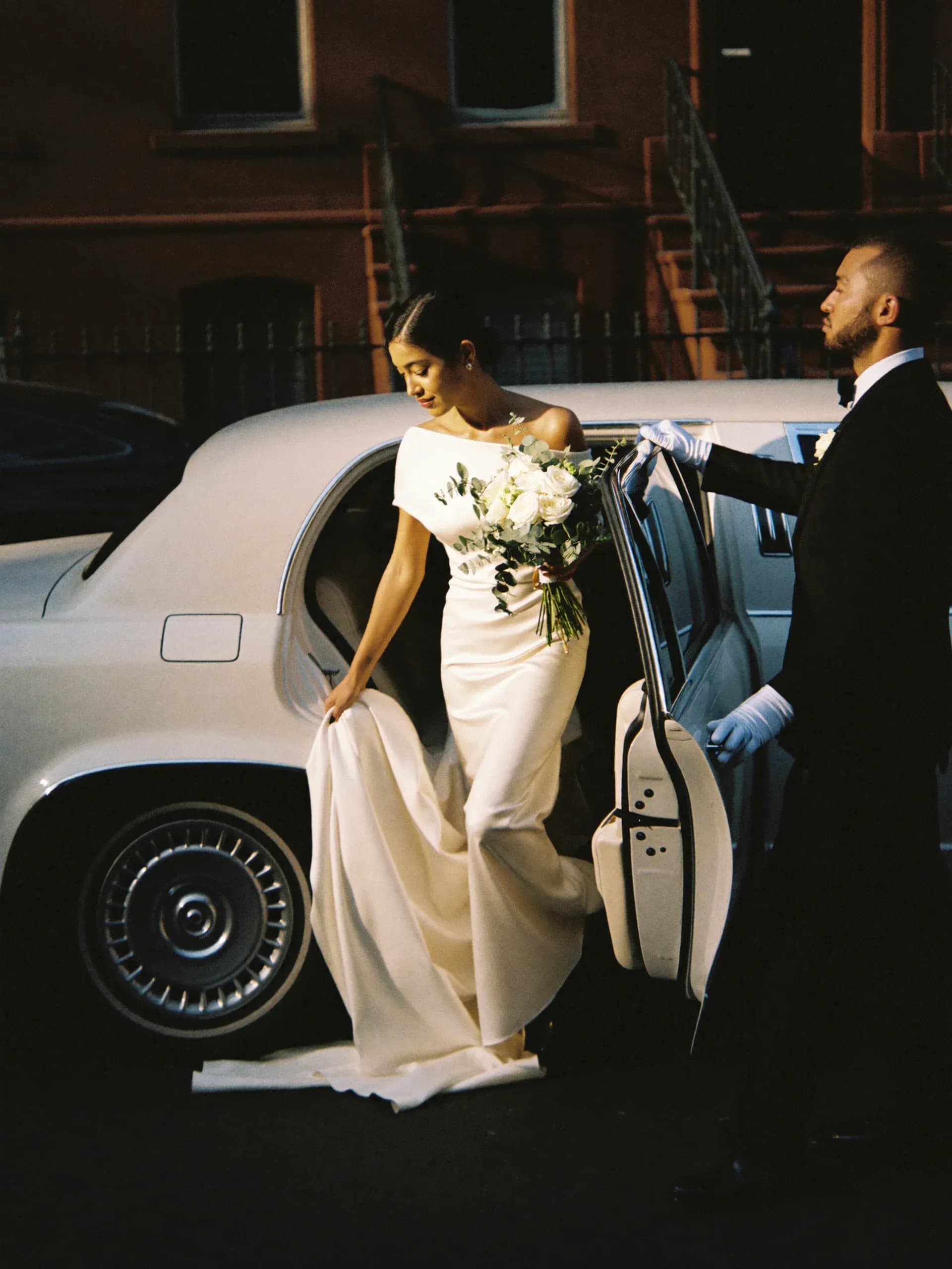 Wedding couple in luxury limousine NYC