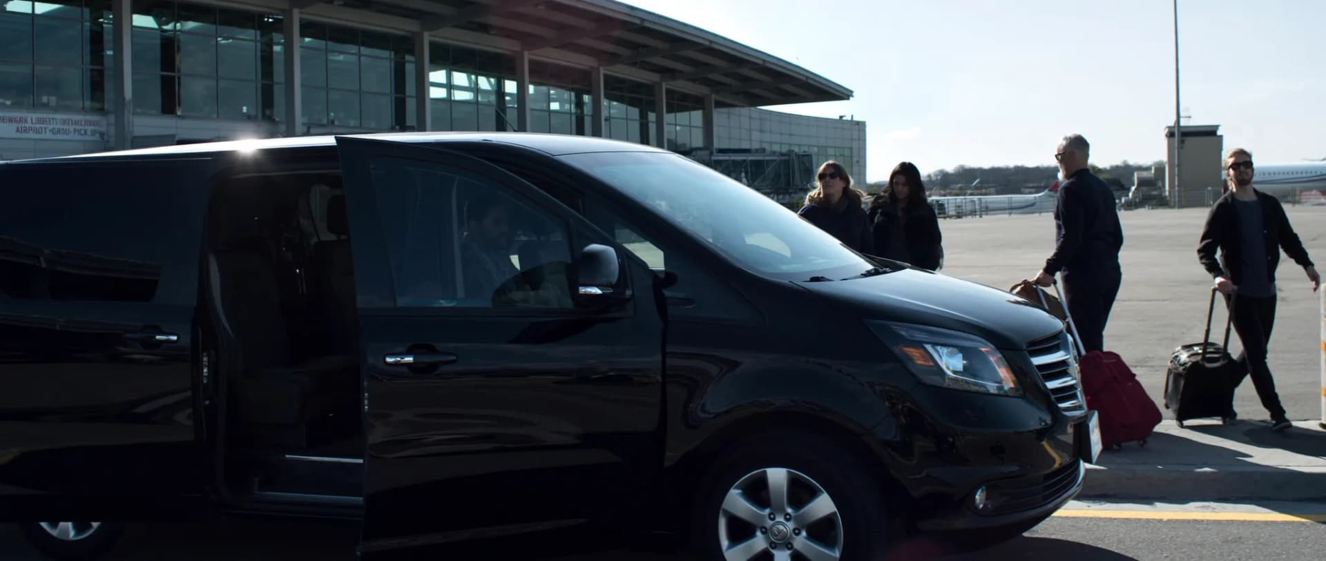 Chauffeured black limo heading to Newark Liberty International Airport from Manhattan