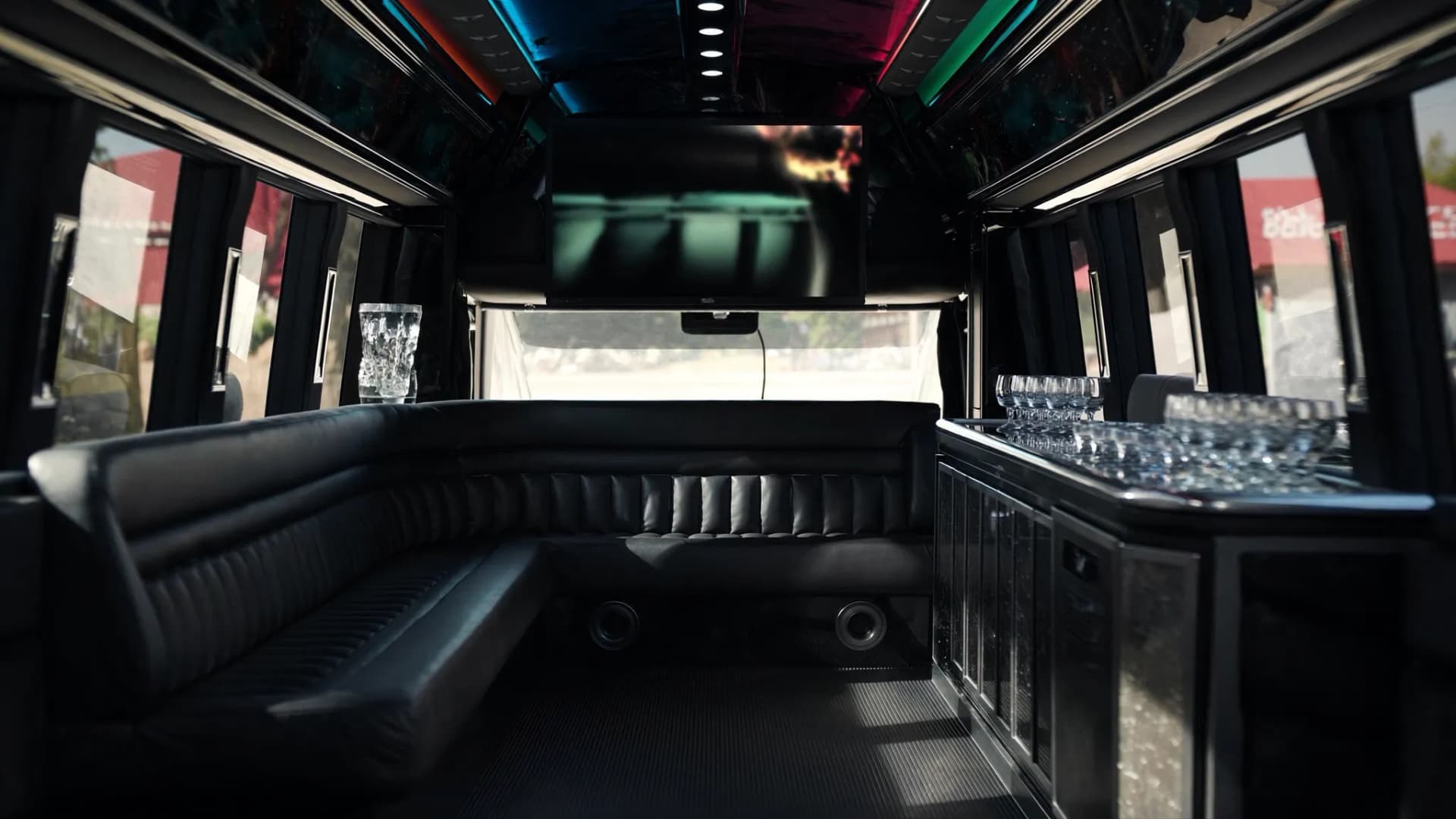 Interior of a luxury party bus with LED lighting available for NYC rentals