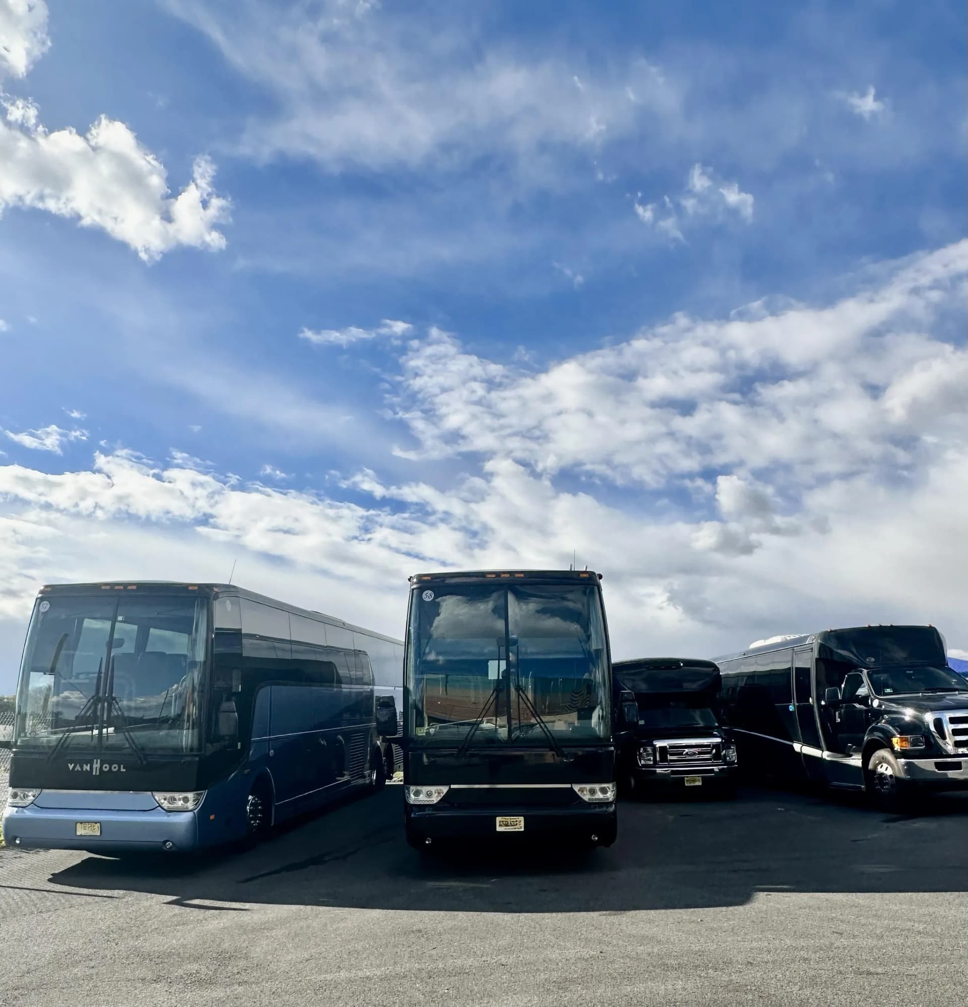 King & Queen charter fleet lined up: coach buses, mini bus and shuttle