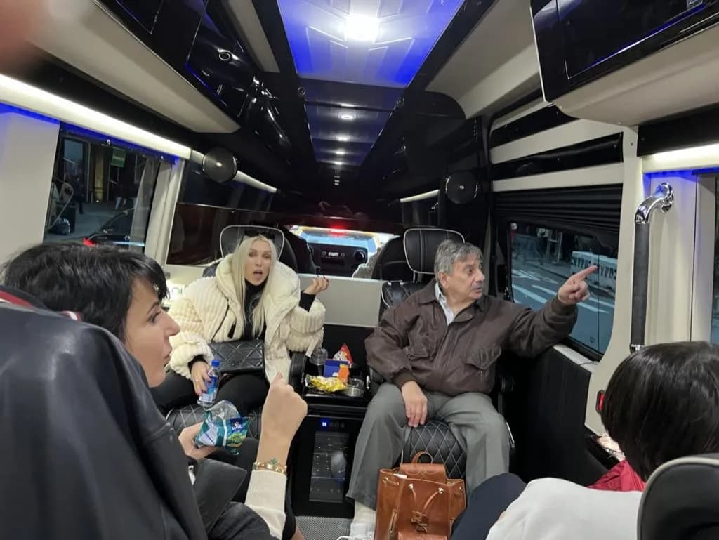 Tour guests chatting inside the executive Sprinter on a guided NYC tour